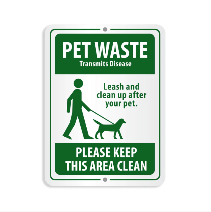 Sign warning about pet waste and proper disposal on a white background